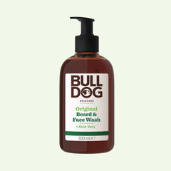 A 300 ml bottle of Original Beard & Face Wash with natural origin ingredients and Aloe Vera, featuring a pump dispenser and a brown and white label with green text, for hydrated skin.