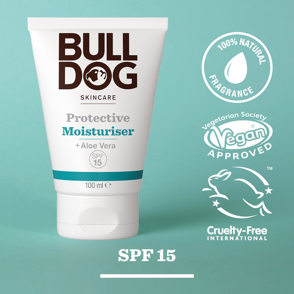 A tube of Protective Moisturiser with Aloe Vera SPF 15 stands against a teal background, featuring badges for natural ingredients. Its vegan approved, cruelty-free, and gentle on skin.