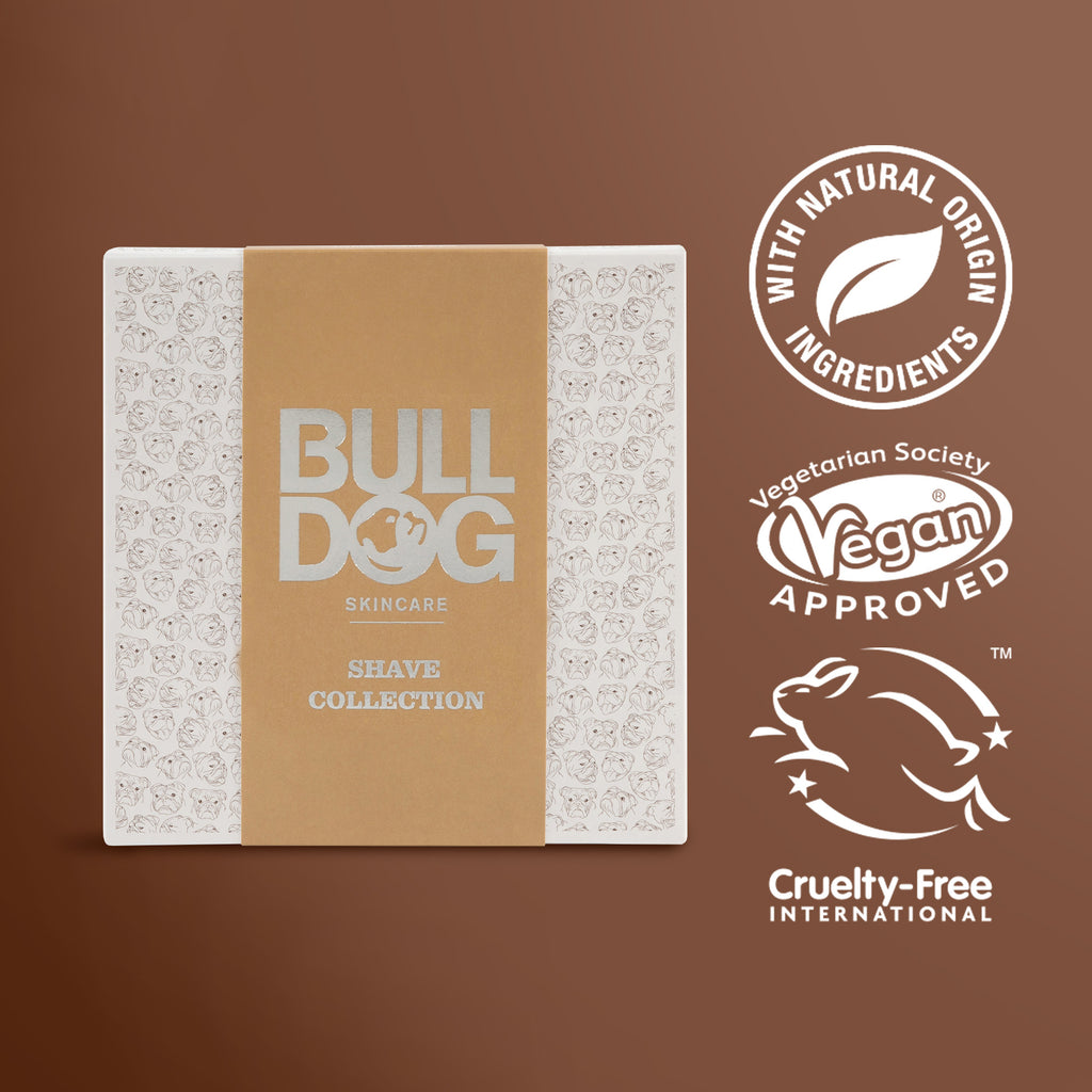 The Premium Gift: Shave Collection box with a bamboo razor is displayed on a brown background. Nearby are logos for natural origin ingredients, Vegan Approved, and Cruelty-Free International—ideal men's gifts.